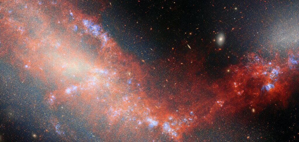 Webb Telescope Captures Dwarf Galaxies Linked by Ancient Gas Bridge