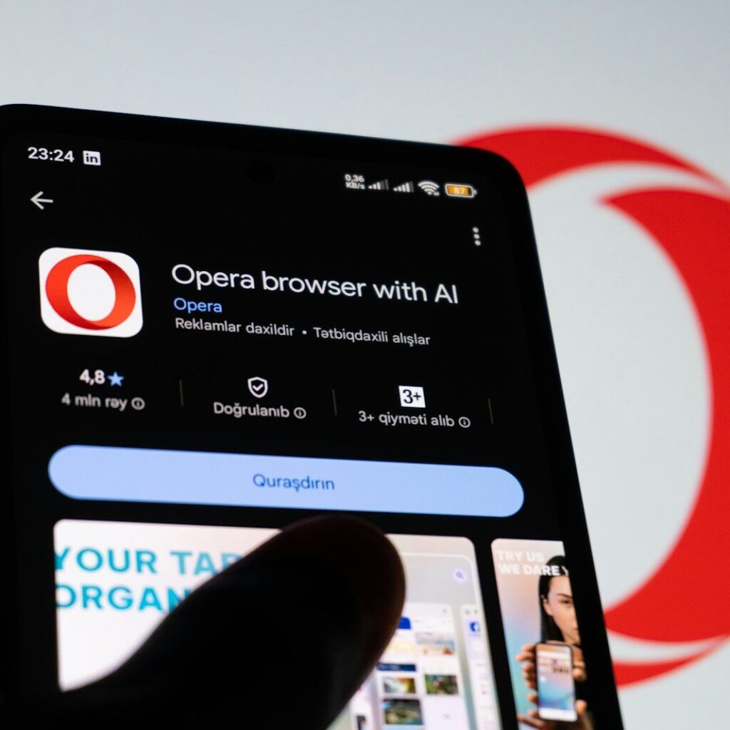 Opera Adds Paste Protect Feature to Block Clipboard-Based Malware Attacks Smartphone displaying opera browser with ai